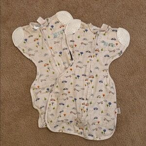 Two self soothing Baby Swaddles.